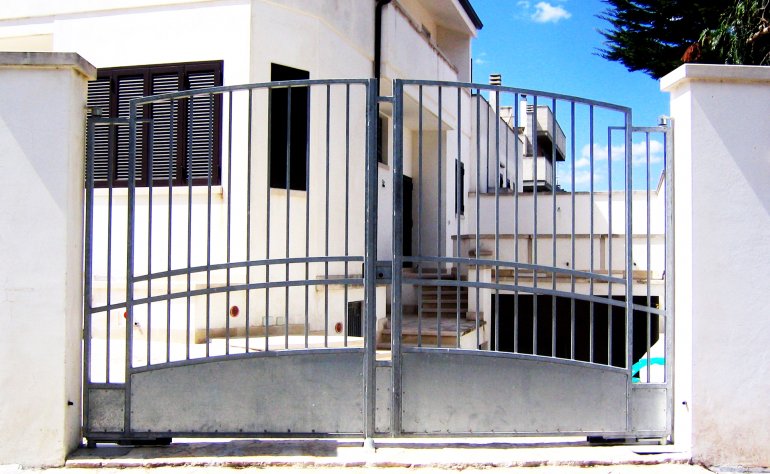 Cancelli centinati in ferro